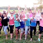 Kids Yoga Teachers in warrior pose outside at the Kids yoga teacher summer certification intensive rcys