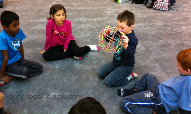 children use a breathing ball, opening and closing it wiht their breath to demonstrate the pace of their breathing.
